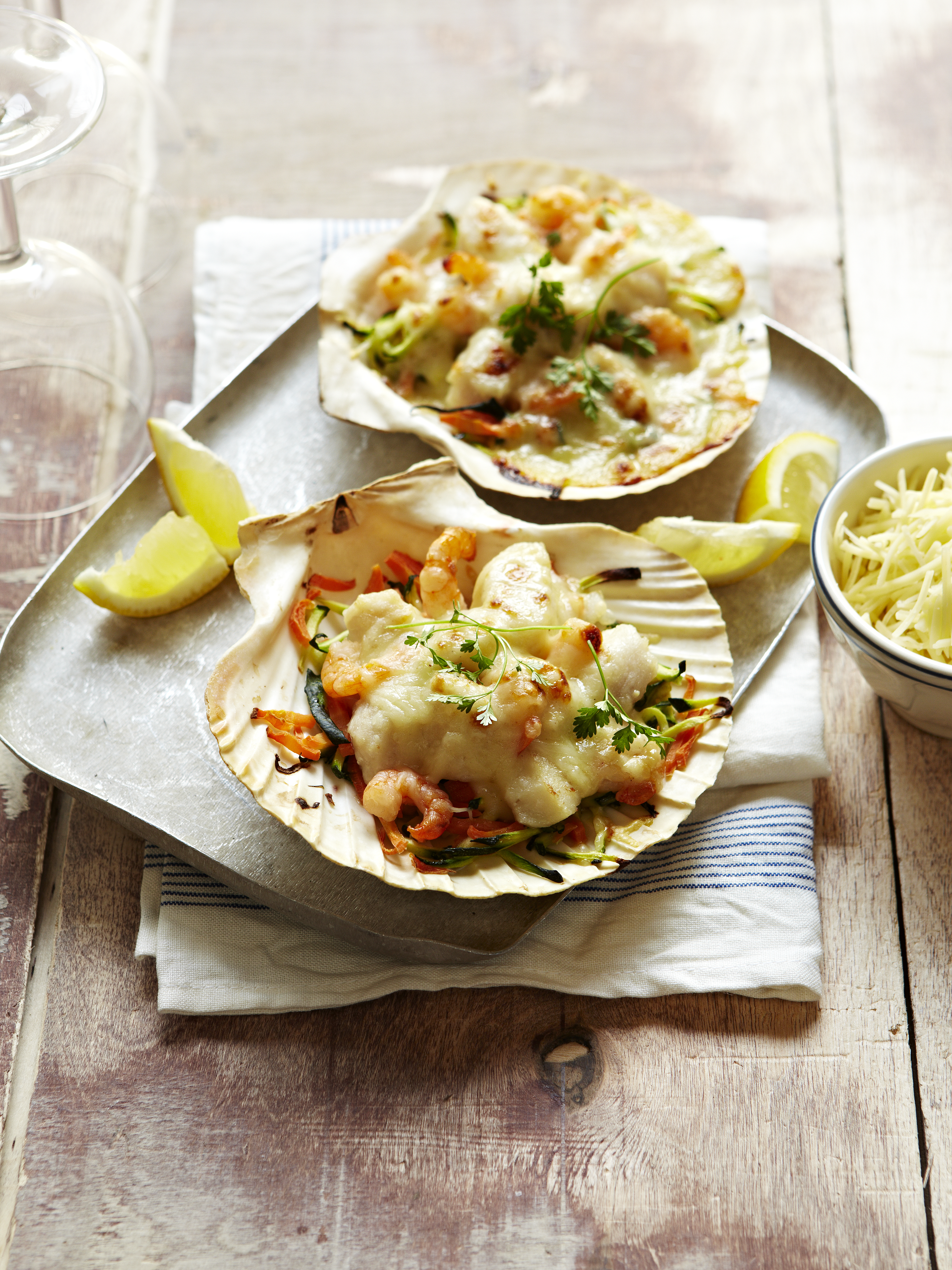 Conchas de pescado gratinadas con Gruyère AOP